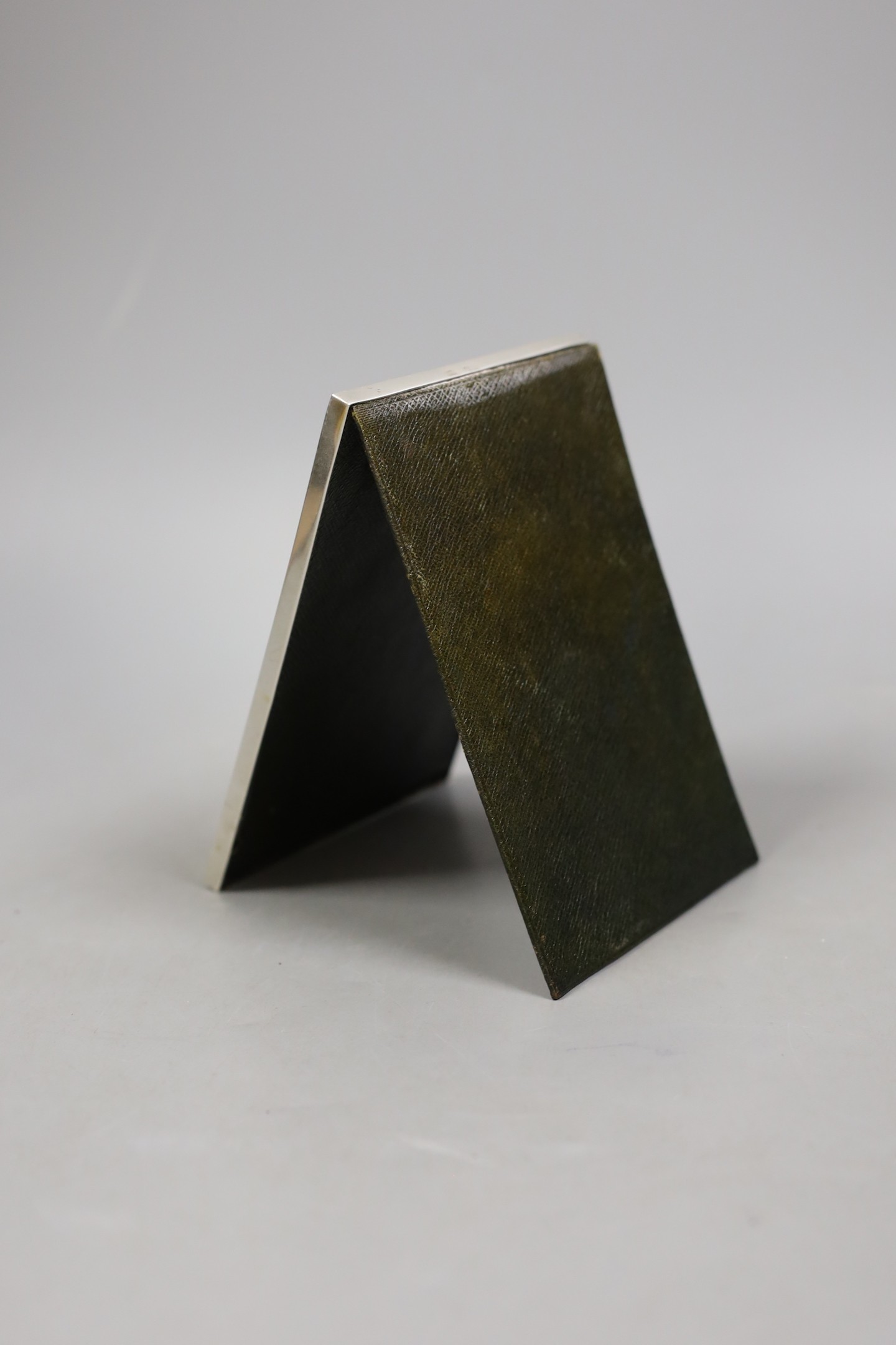A small modern sterling mounted rectangular mirror, retailed by Asprey, London, 15.4cm.